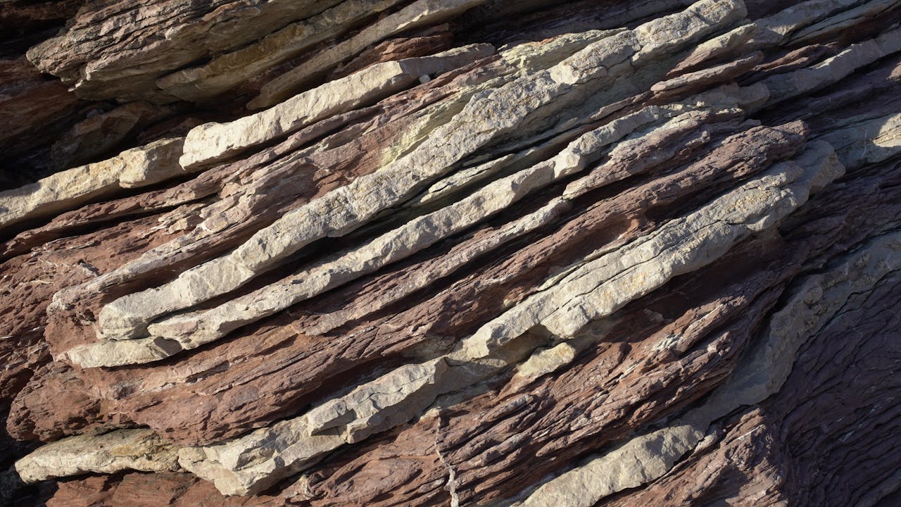 Detailed view of layered rock formations showing natural geological patterns and textures.